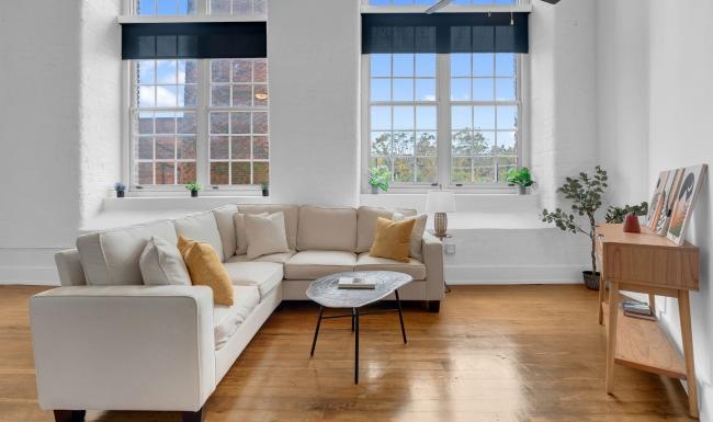 a living room with a white couch