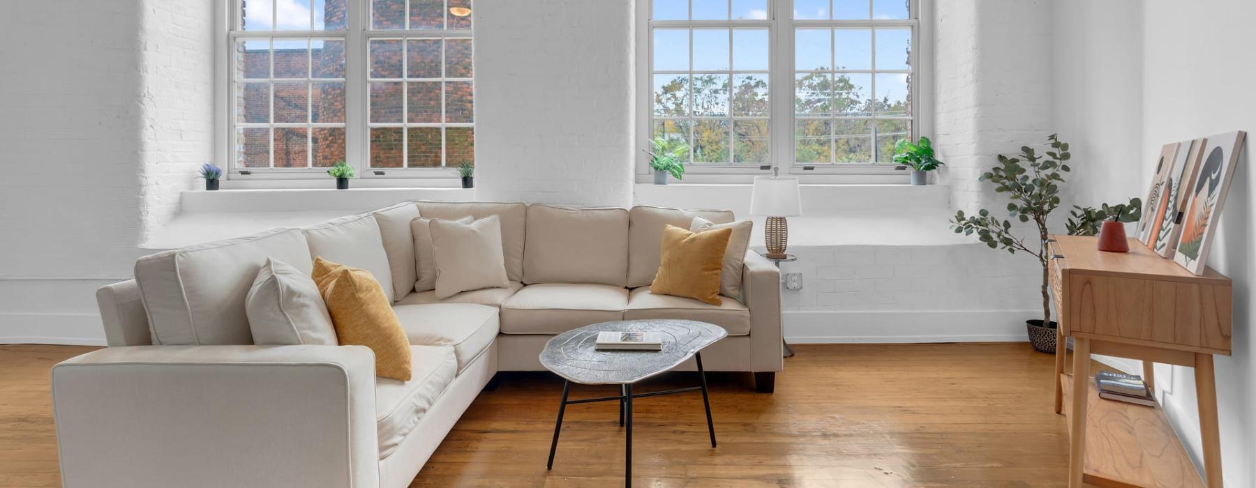a living room with a white couch